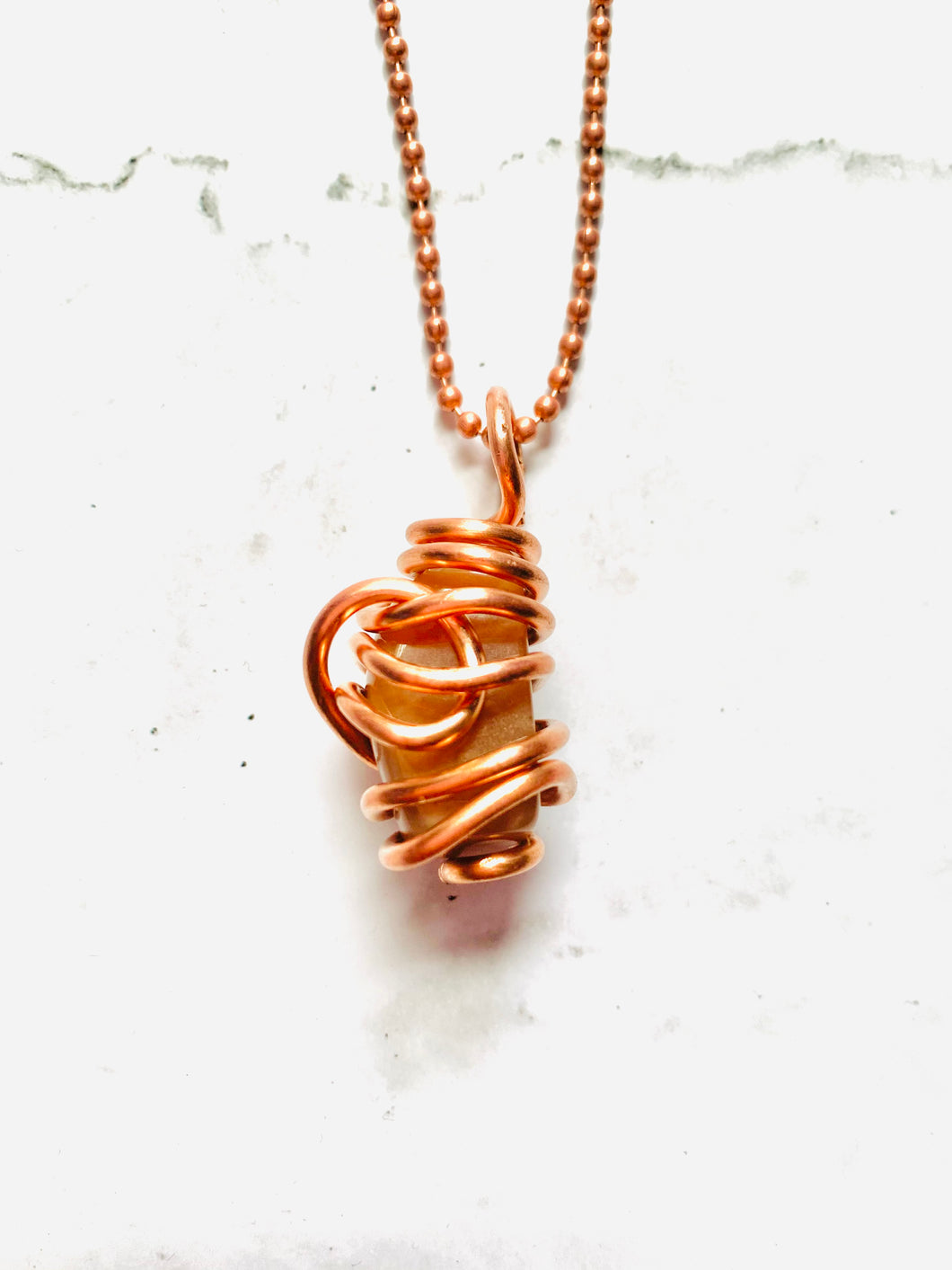 Moonstone Crystal wrapped in Copper