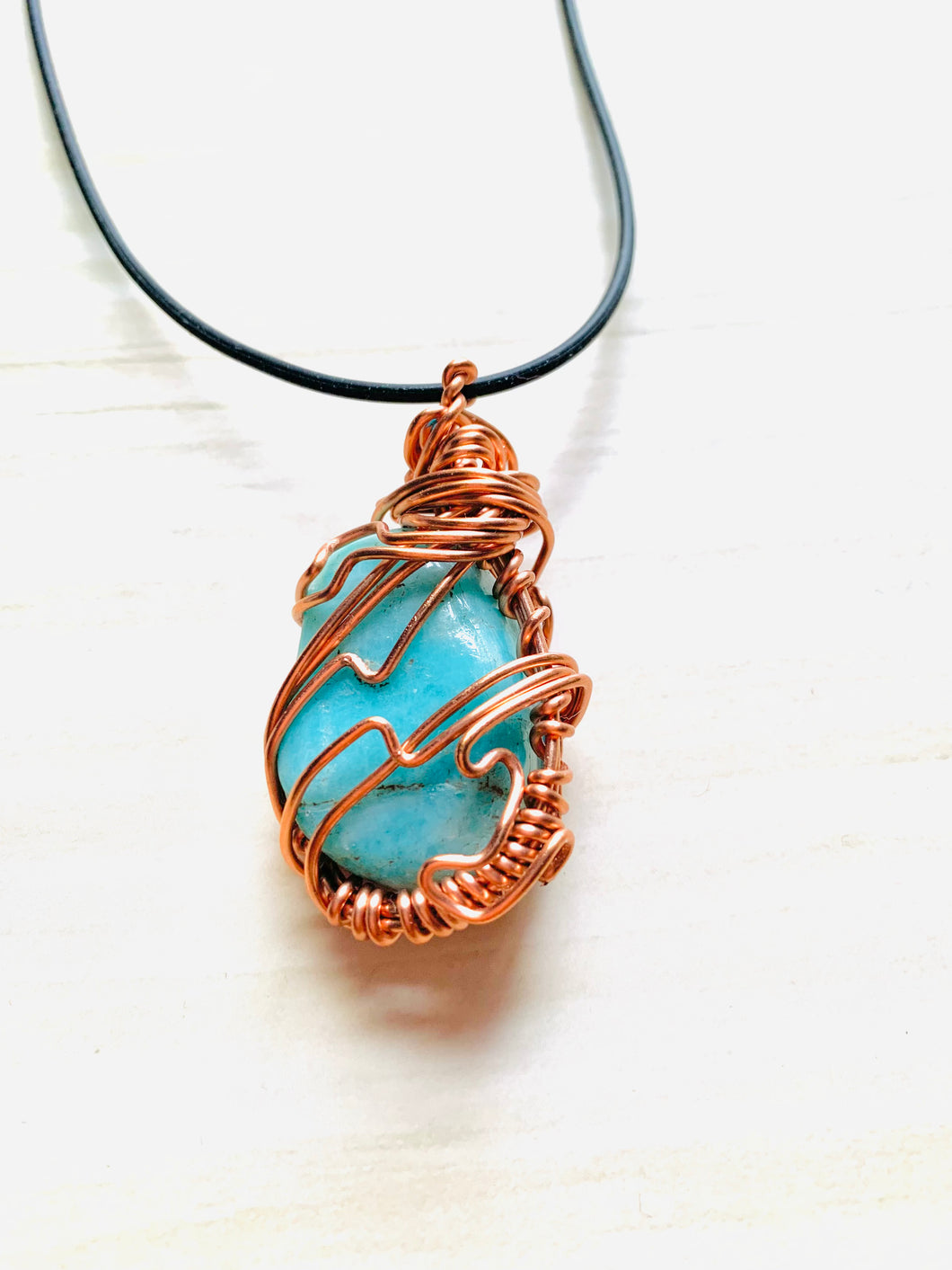 Turquoise healing stone Wrapped in Copper design